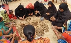 cow dung lamp by Muslim women