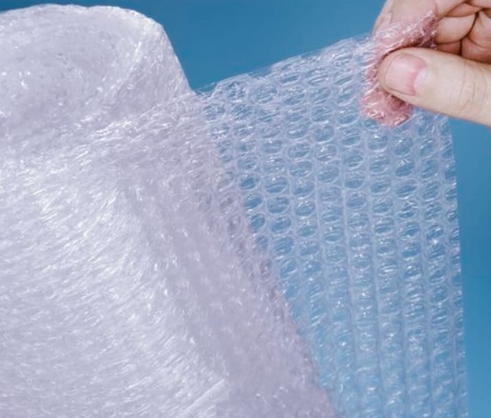 Bubble wrap invented as wallpaper, bursting brings joy and relaxation Bubble Wrap दीवारों को