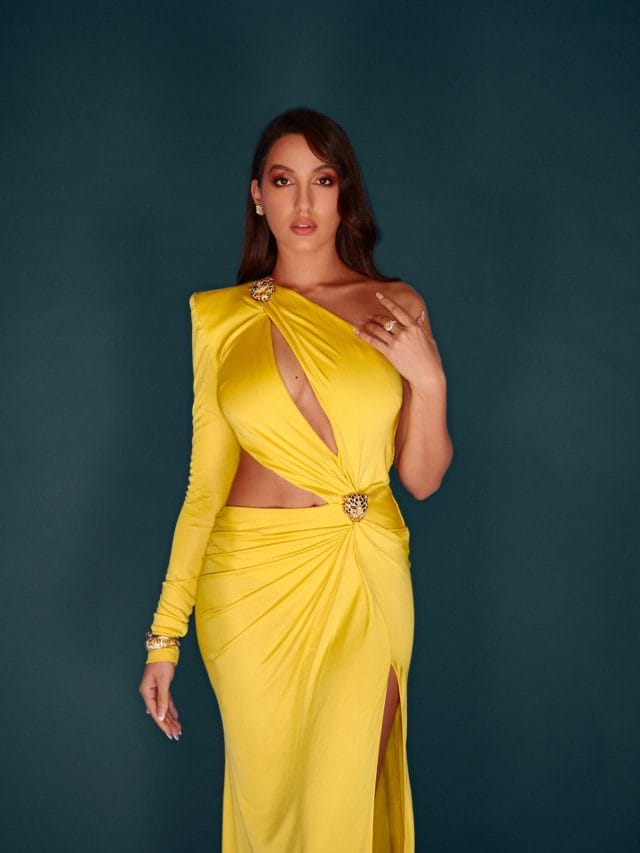 पीला गाउन पहनकर Nora Fatehi ने धड़काया फैंस का दिल, देखें हॉट फोटोज