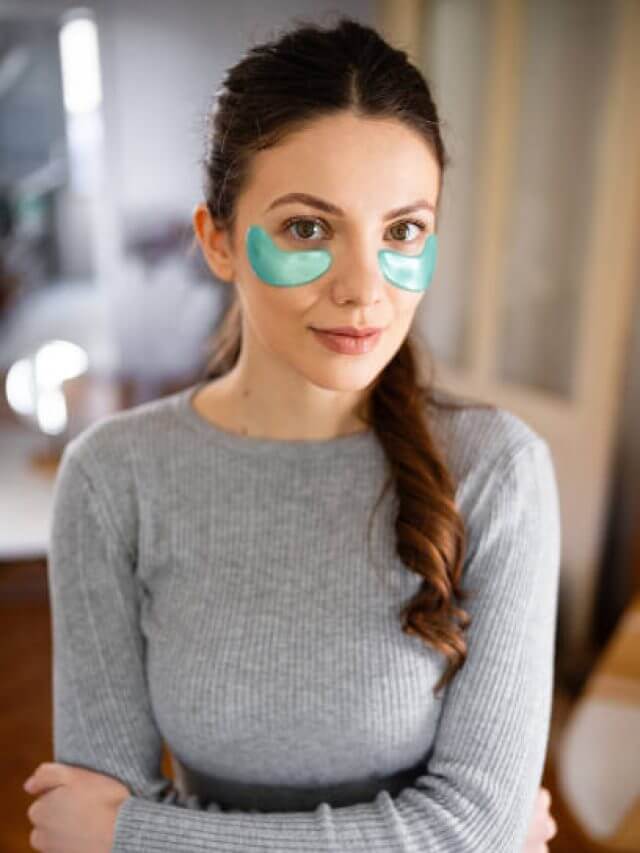 Portrait of beautiful young woman with hydrogel under-eye recovery patches.