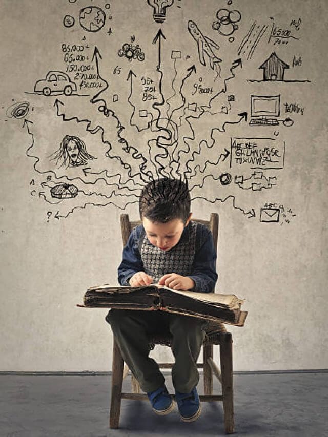 A young child read a book that enhance his wild imagination