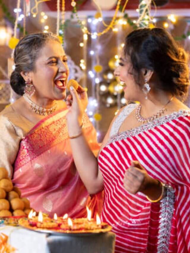 Daughter in law feeds mother in law Laddoo during Diwali celebrations