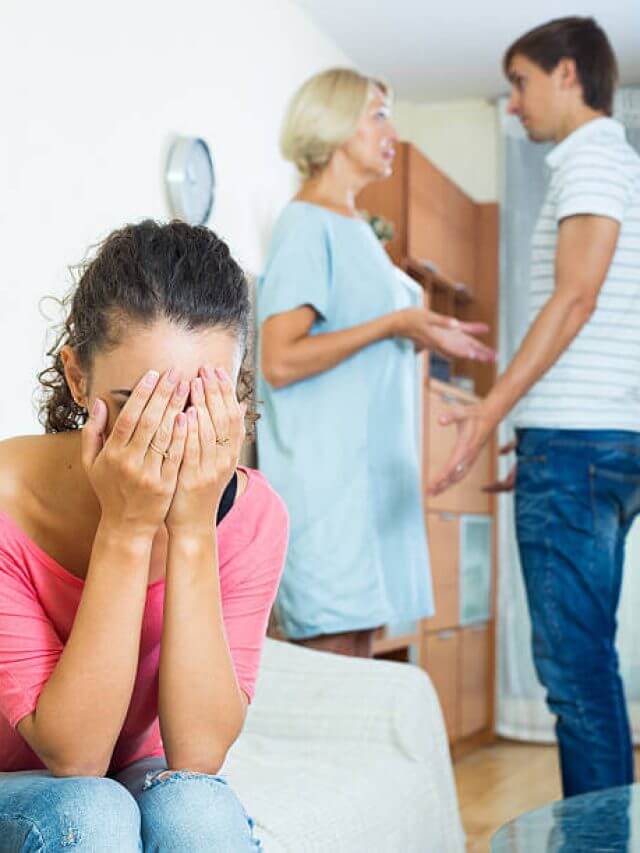 Frustrated young woman taking hard argue between husband and mother