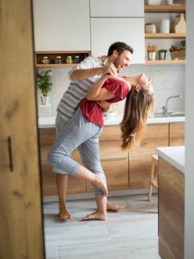 Two Lovers dancing in the kitchen.