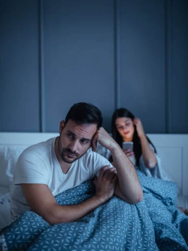 A young man is being neglected by his girlfriend.