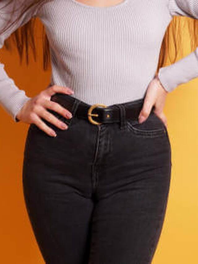 midsection of unrecognizable young curvy woman wearing tight black jeans