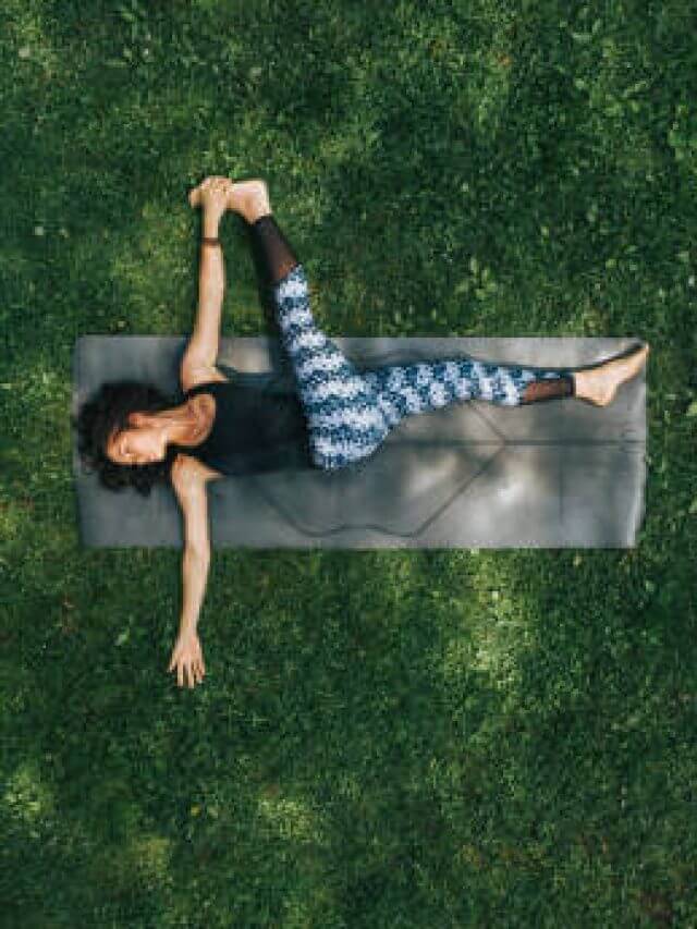 Aerial View of Woman doing Yoga in the Park